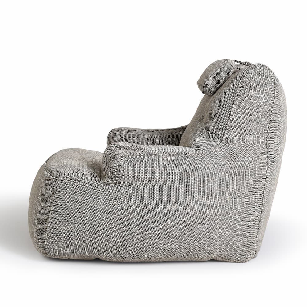 натуральное уличное лаунж-кресло Tranquility Armchair из Sofa Weave для террасы, сада и веранды — фото в интерьере