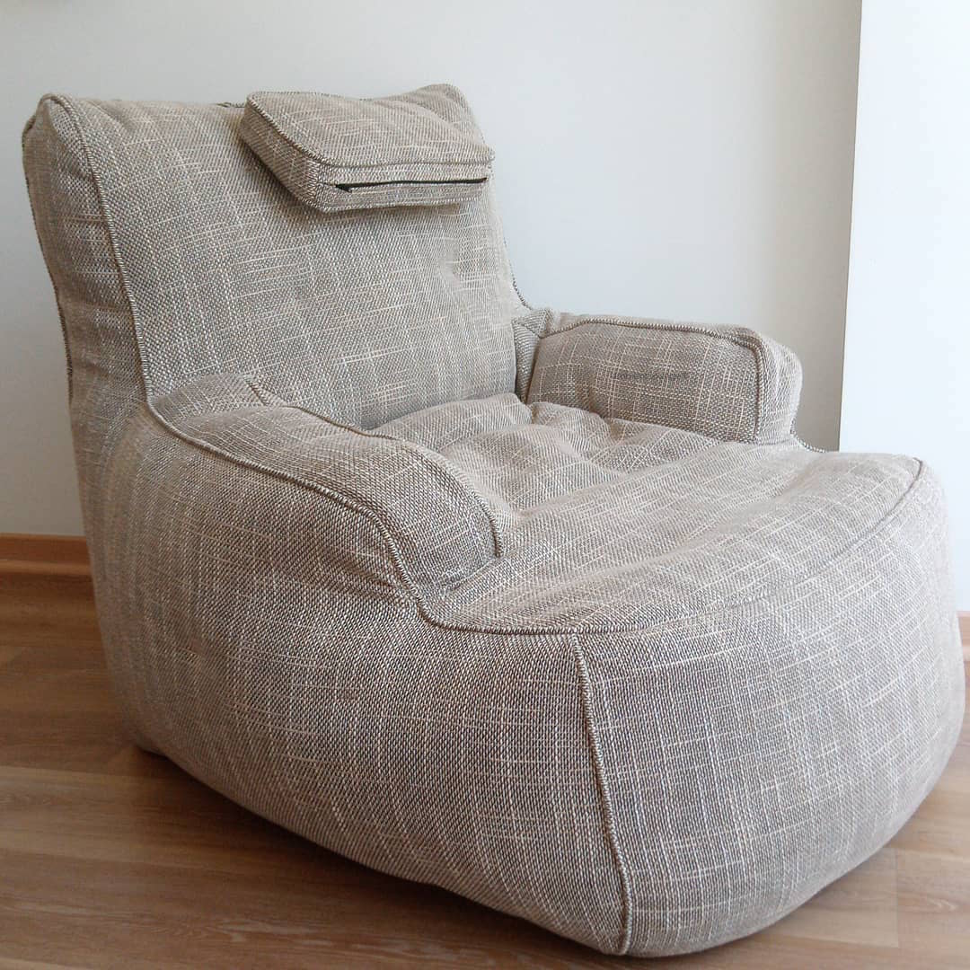 натуральное уличное лаунж-кресло Tranquility Armchair из Sofa Weave в интерьере терраса
