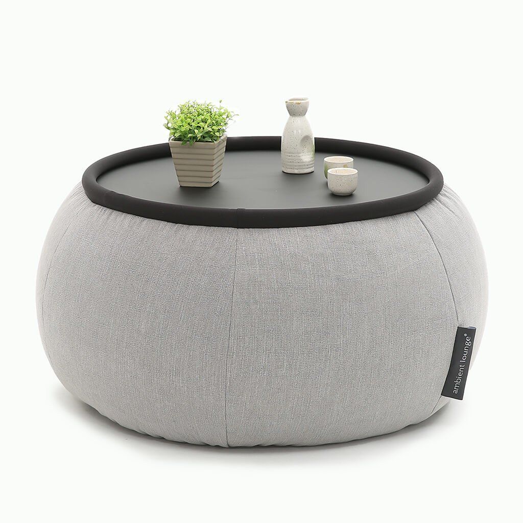 серое складной столик Versa Table из Sofa Weave в интерьере гостиная
